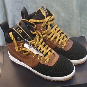 Nike Black and Brown Leather Boots with Durable Design